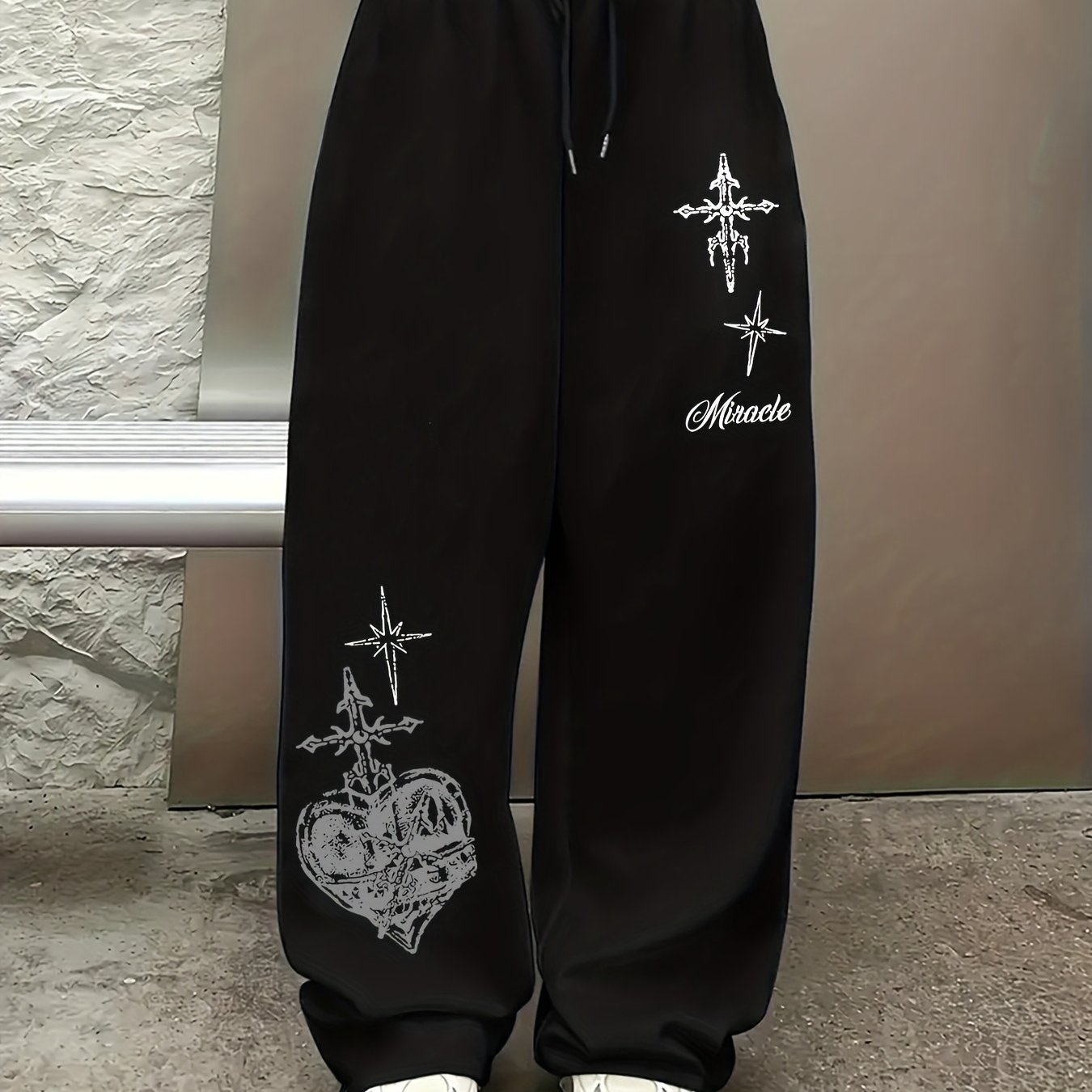 Pantalones negros con estampad - Winter Clothing Patterns reseña y precio